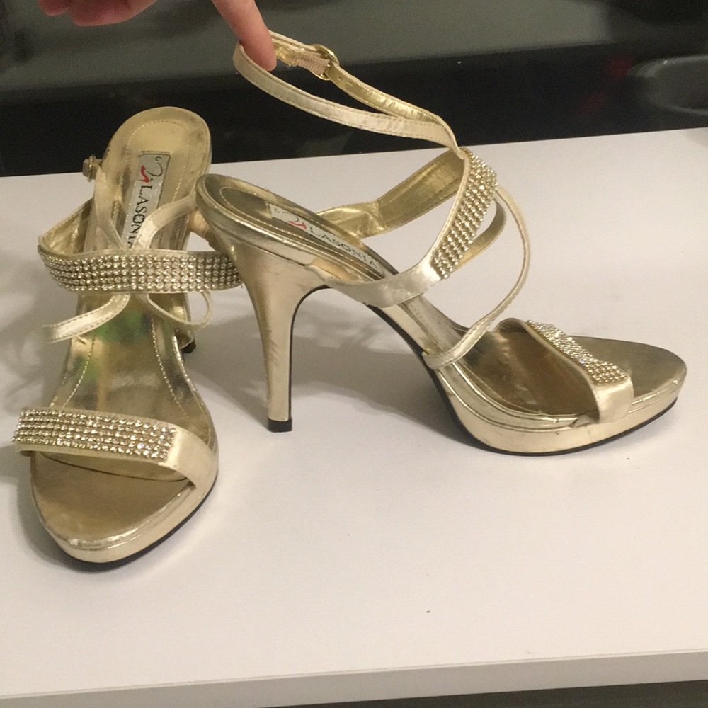 Gold and rhinestone heels